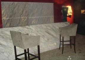 天然石材雪花白形象墻與吧臺